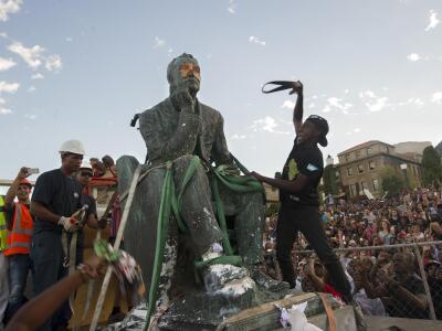 After it was defaced by protesting students at the U. of Cape Town, a statue of Cecil Rhodes, who helped create the apartheid system of South Africa, was removed from the campus.