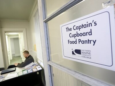 About 74 percent of colleges surveyed by Naspa — Student Affairs Administrators in Higher Education reported offering some kind of emergency financial aid. For administrators, the many types of such aid present challenges, and sometimes thorny questions, like whether items from a food pantry should be counted as aid toward a student’s total cost of attendance. Above, an official at Southern Maine Community College waits for visitors to a food pantry there.