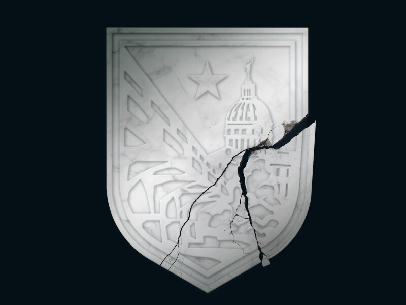 Illustration of the UATX seal depicted as a cracked stone.