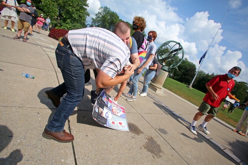 Oliver Baker and Avi Rachlin, at odds.
