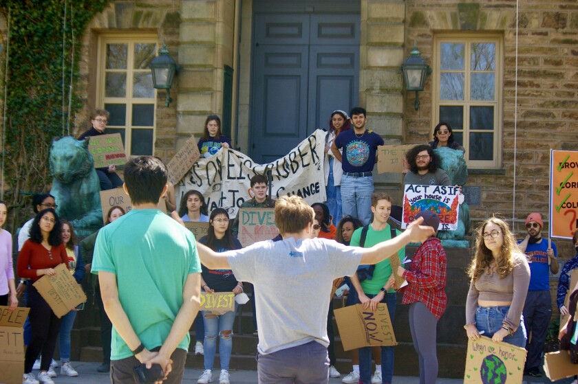 Princeton student protestors call for the university to divest from greenhouse gas emitters during a demonstration on campus on Earth Day 2022. (Hannah Reynolds, Divest Princeton)