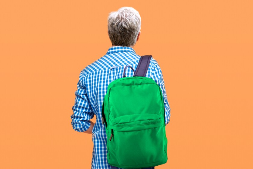 An older non-traditional student and his backpack
