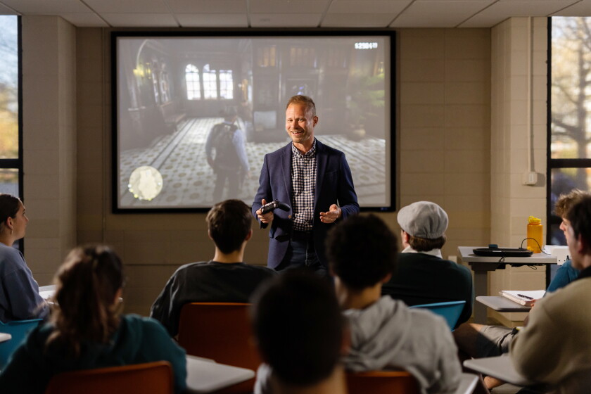 Tore Olsson, Associate Professor of History and Director of Graduate Studies, uses the video game Red Dead Redemption to teach his class “Red Dead History: Exploring America’s Violent Past Through the Hit Video Games” inside a Humanities and Social Sciences building classroom on March 29, 2023.