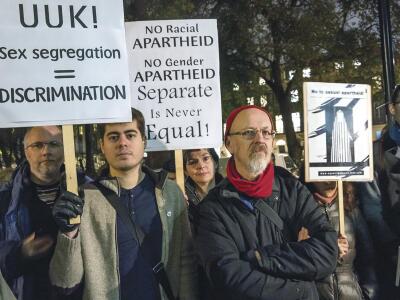 Demonstrators outside the offices of the main British higher-education association protest its recent guidance to allow gender segregation at certain events.