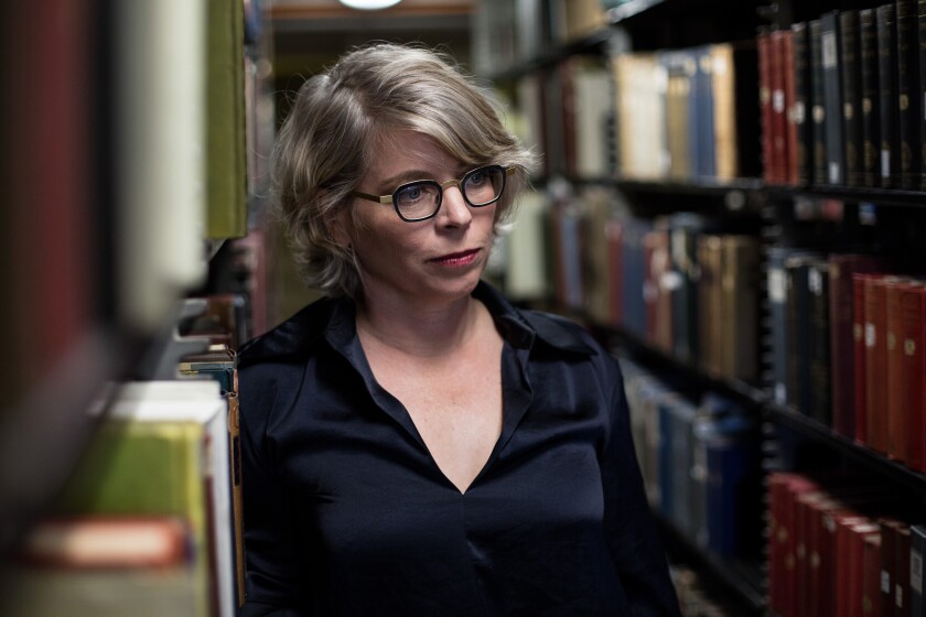 Historian and author Jill Lepore in the stacks of the Widener Library at Harvard University, in Cambridge, Mass., on September 5, 2018.