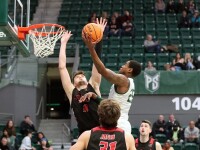 February 04, 2023: Portland State Vikings guard Hunter Woods (25) launches high for a layup over an Eastern Washington defender during the NCAA basketball game between the Portland State Vikings and Eastern Washington Eagles at the Stott Center, Portland.