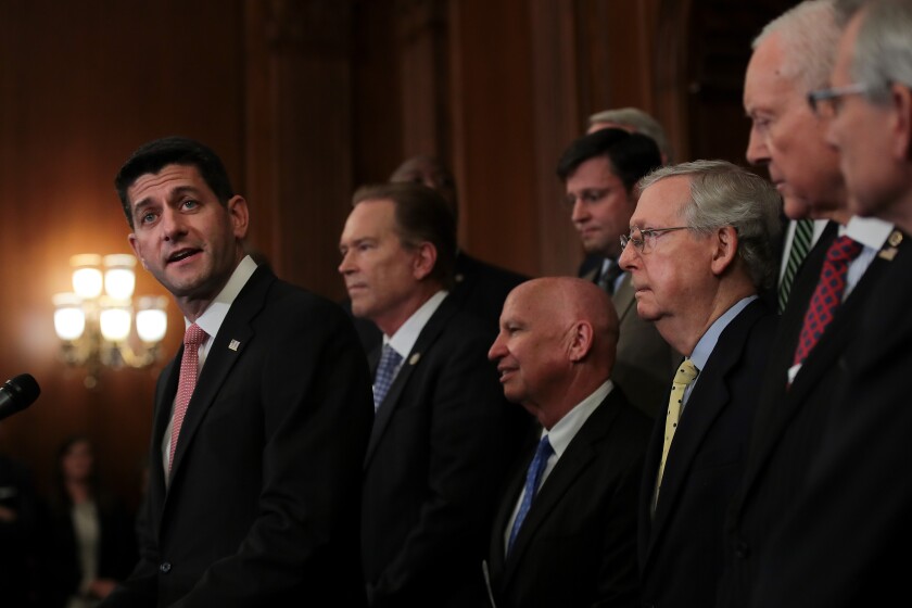 Rep. Paul Ryan of Wisconsin (left), Sen. Mitch McConnell of Kentucky (third from right), and other Republican leaders in Congress in an appearance days before their respective chambers were due to vote on legislation that would overhaul the tax code.