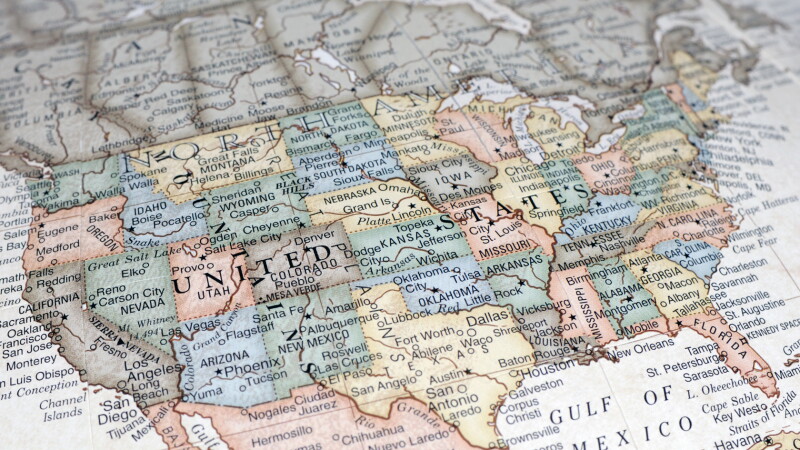 Illustration of 3D U.S. map overlaying statistics