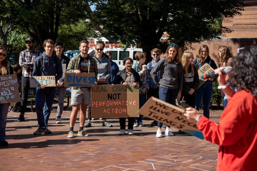 Students from Tufts and other nearby universities call for Tufts to divest from fossil fuels during a protest at Lower Campus Center on Sept. 23, 2022. (David Kim, The Tufts Daily)