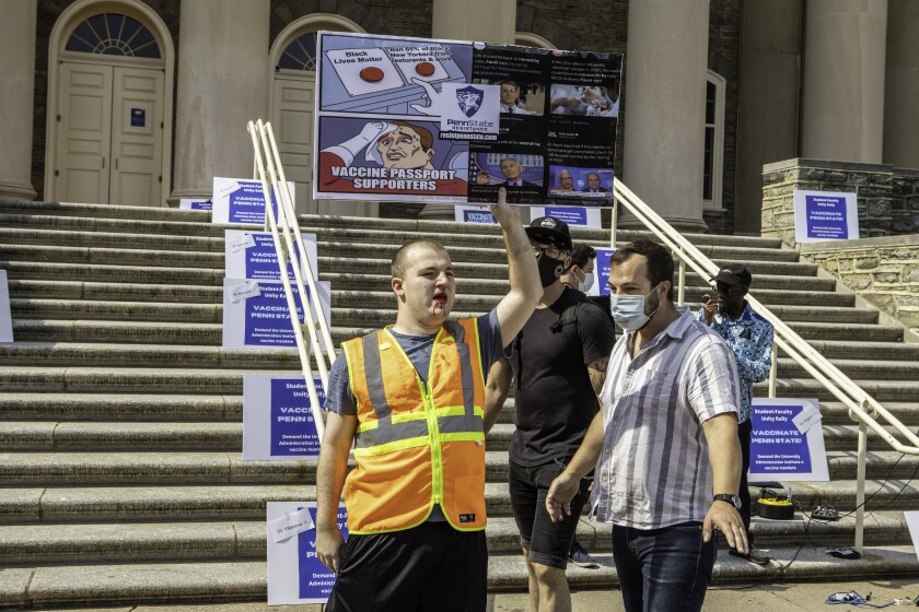 Rachlin and Baker at the August 2021 protest, after Rachlin’s nose begins to bleed.