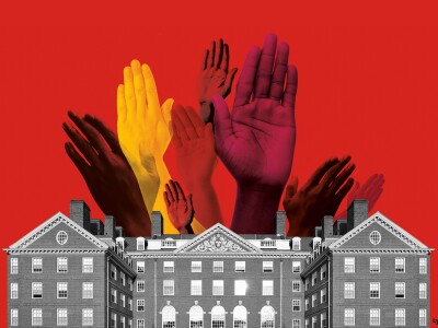 A diverse group of raised hands above a university building