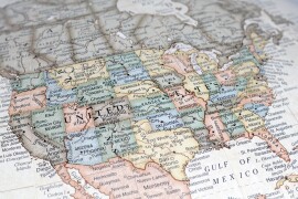 Illustration of 3D U.S. map overlaying statistics